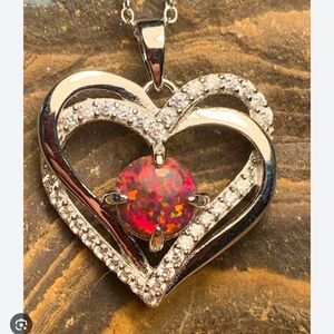 Elegant Heart Pendant Necklace with Red Gemstone